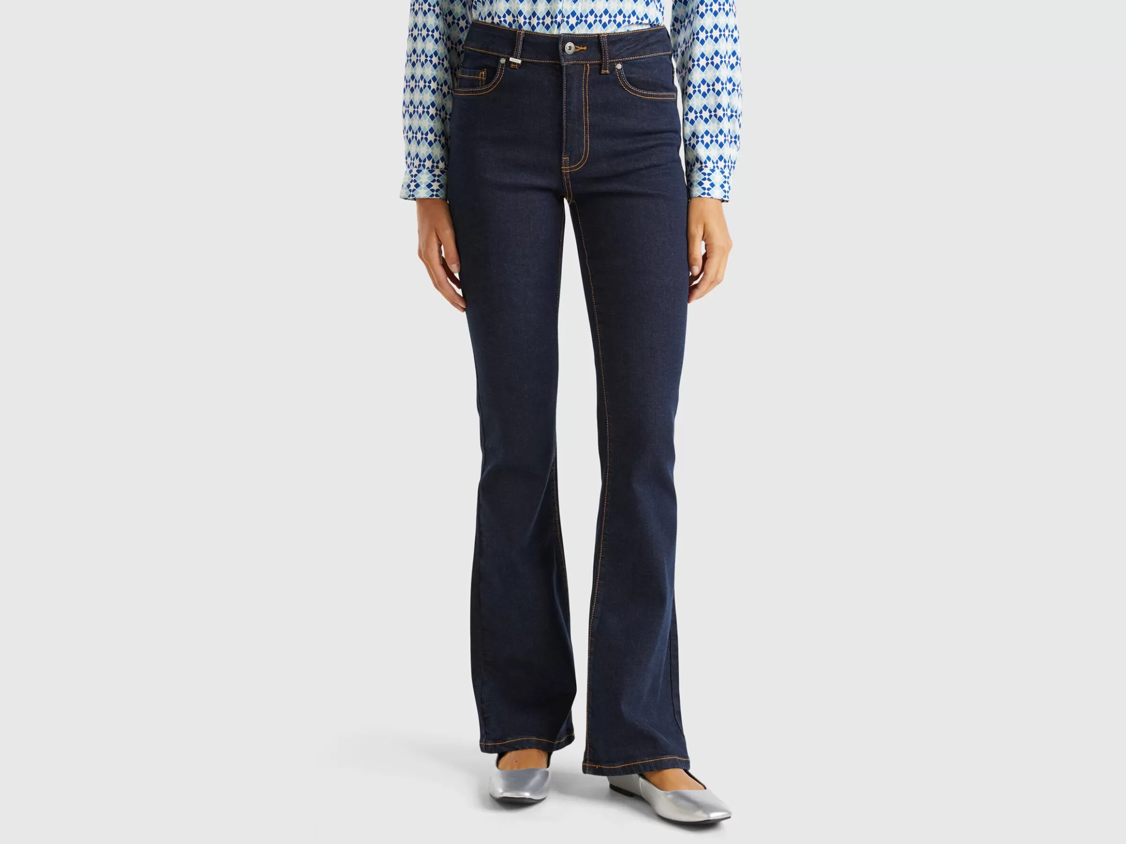 United Colors of Benetton Flared jeans in recycled cotton blend