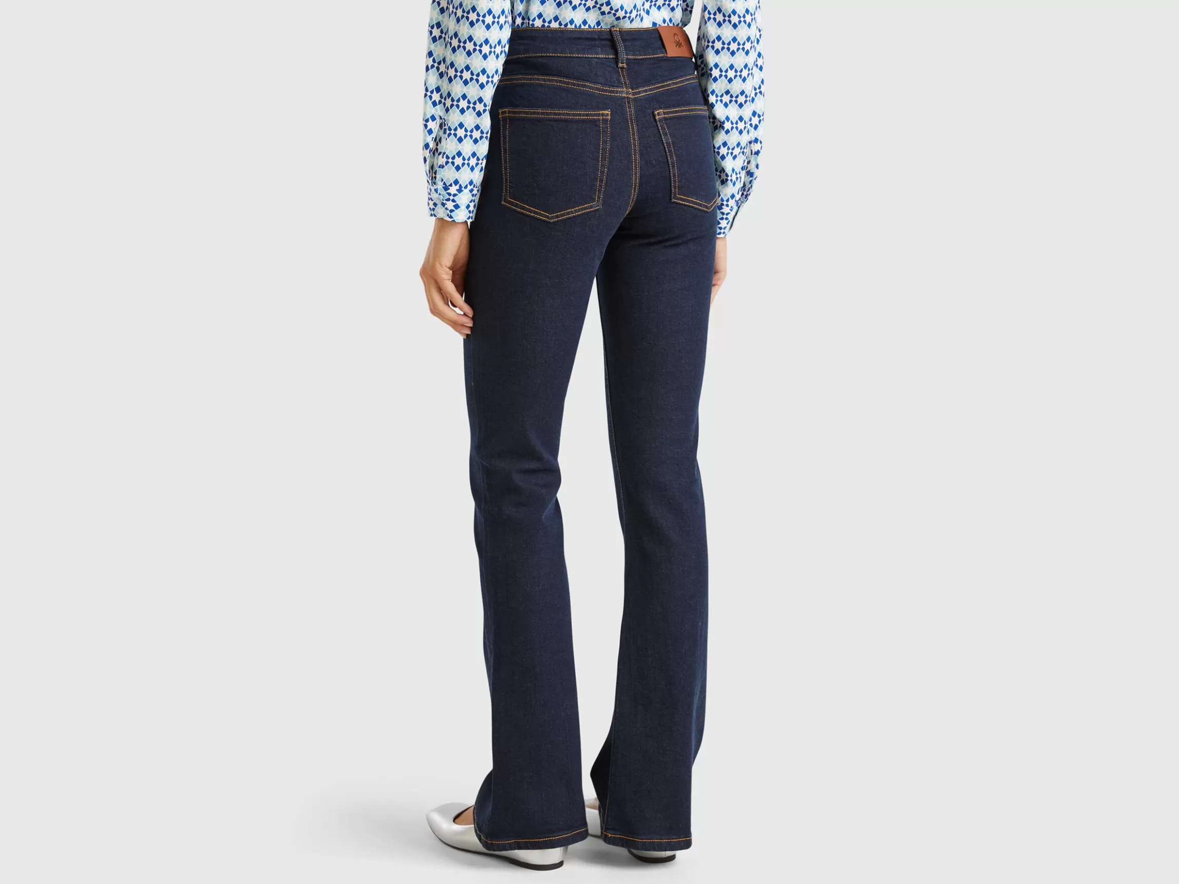 United Colors of Benetton Flared jeans in recycled cotton blend